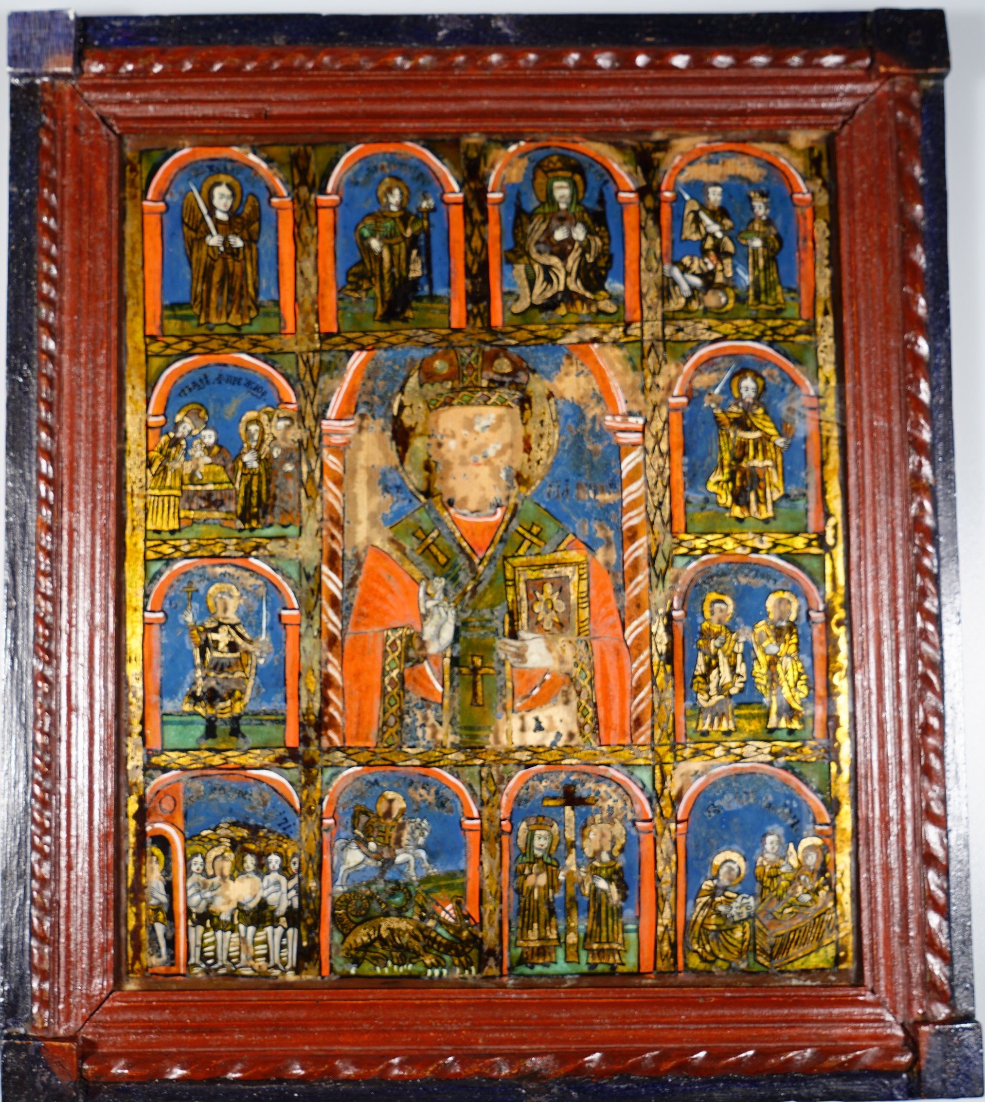 Icon on glass: Saint Nicholas with 12 scenes